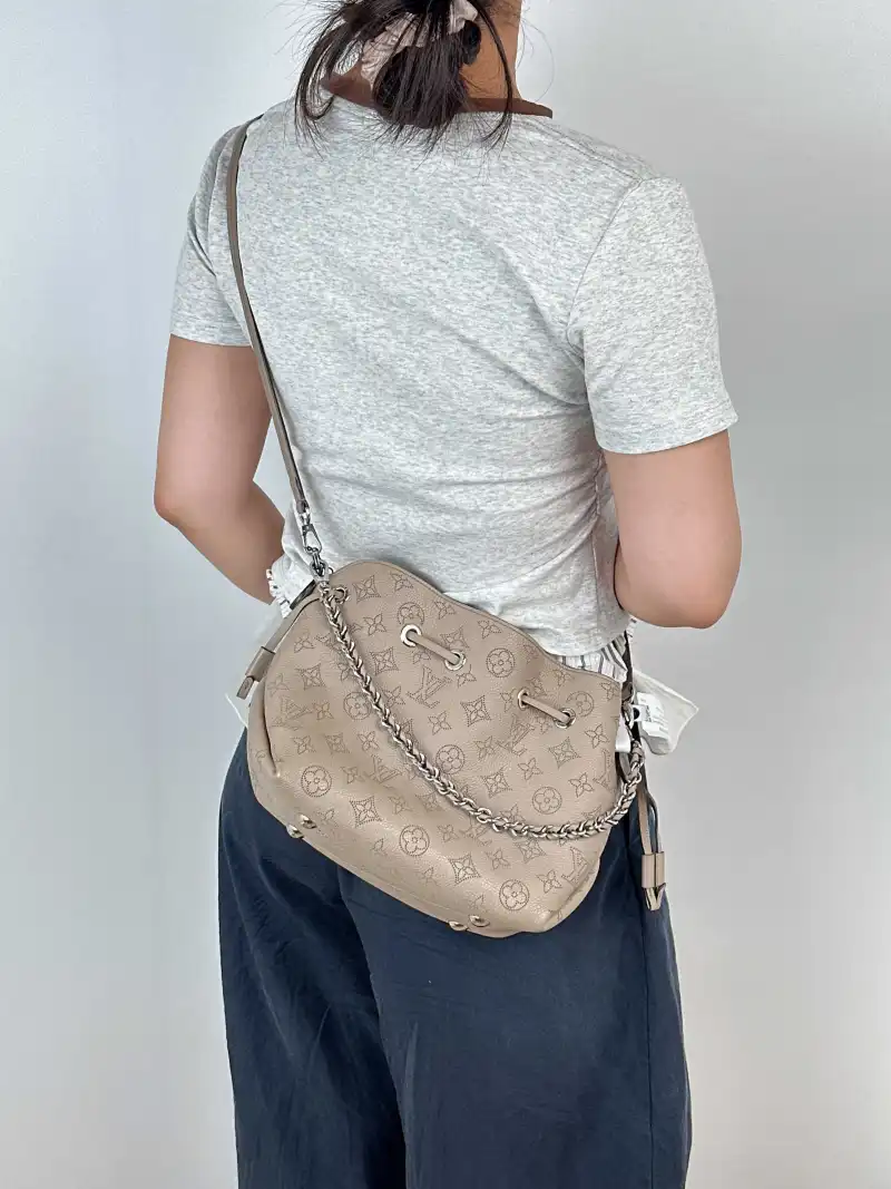 Louis Vuitton Crossbody Bag BELLA Calfskin One Size 22 × 14 × 19 cm — on-model view 2 of 3