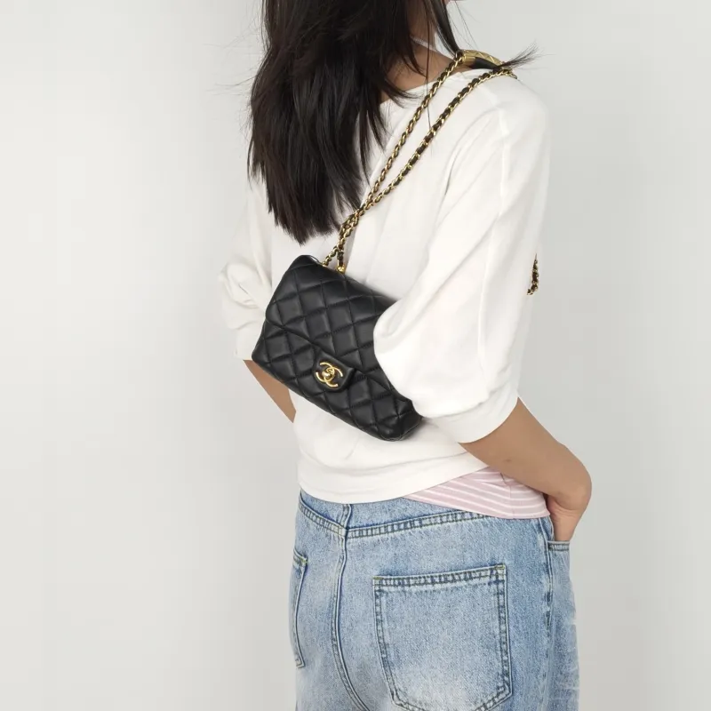 Chanel Crossbody Bag24b Crossbody Bag Black Lambskinmini18 × 6 × 11 cm — on-model view 1 of 3