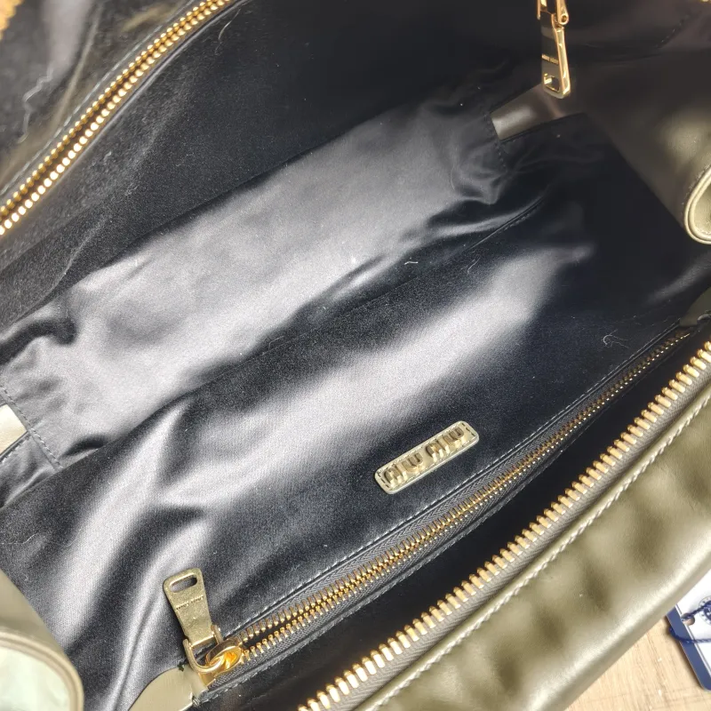 Miumiu Top Handle Bag Beau CC alfskin 34 × 10 × 23 cm — detail view 1 of 12