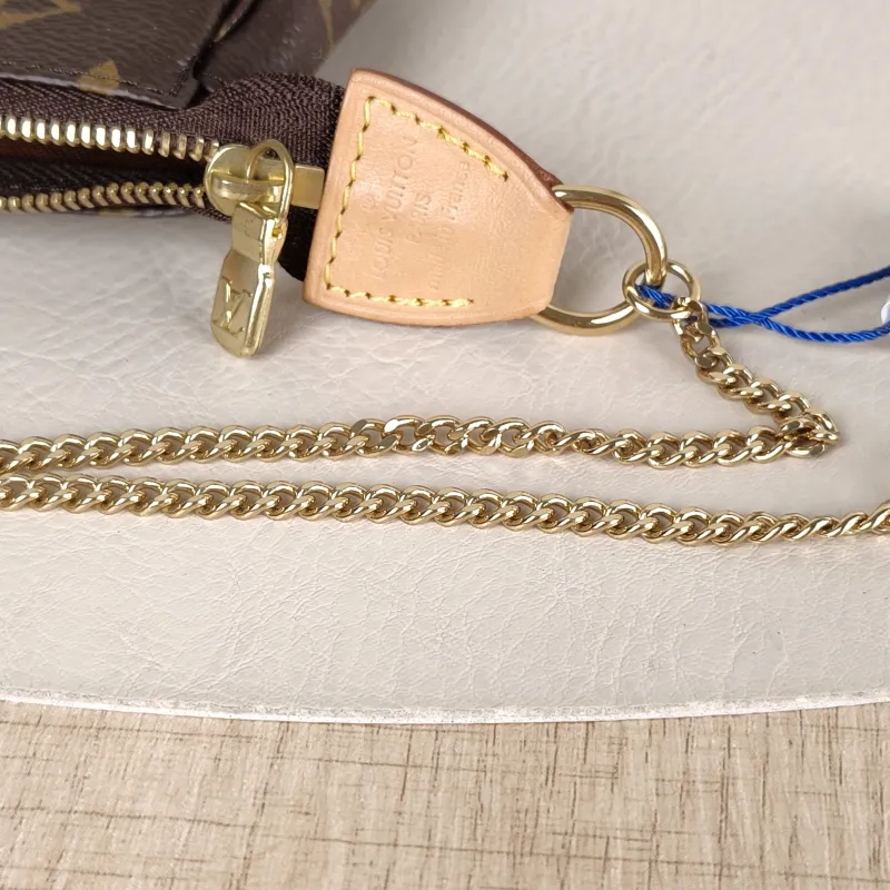 Louis Vuitton Clutch Mini Pochette Accessoires Monogram PVC Mini 15.5 × 4 × 10.5 cm — detail view 2 of 8