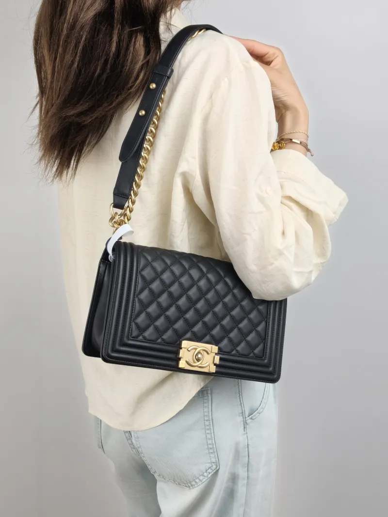 Chanel Crossbody Bag Le Boy​ Black Calfskin Medium 25 × 9 × 15 cm 27 — on-model view 1 of 2