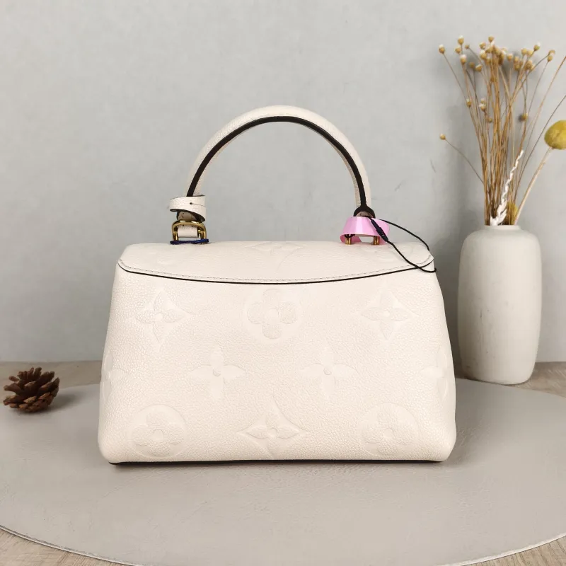 Louis Vuitton Crossbody Bag MADELEINE White Monogram Empreinte Embossed Calfskin BB 24 × 8.5 × 17 cm — cover view 3 of 5