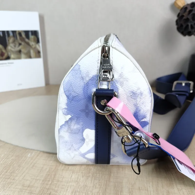 Louis Vuitton Crossbody Bag City Keepall PVC Medium 27 × 13 × 17 cm — detail view 9 of 11