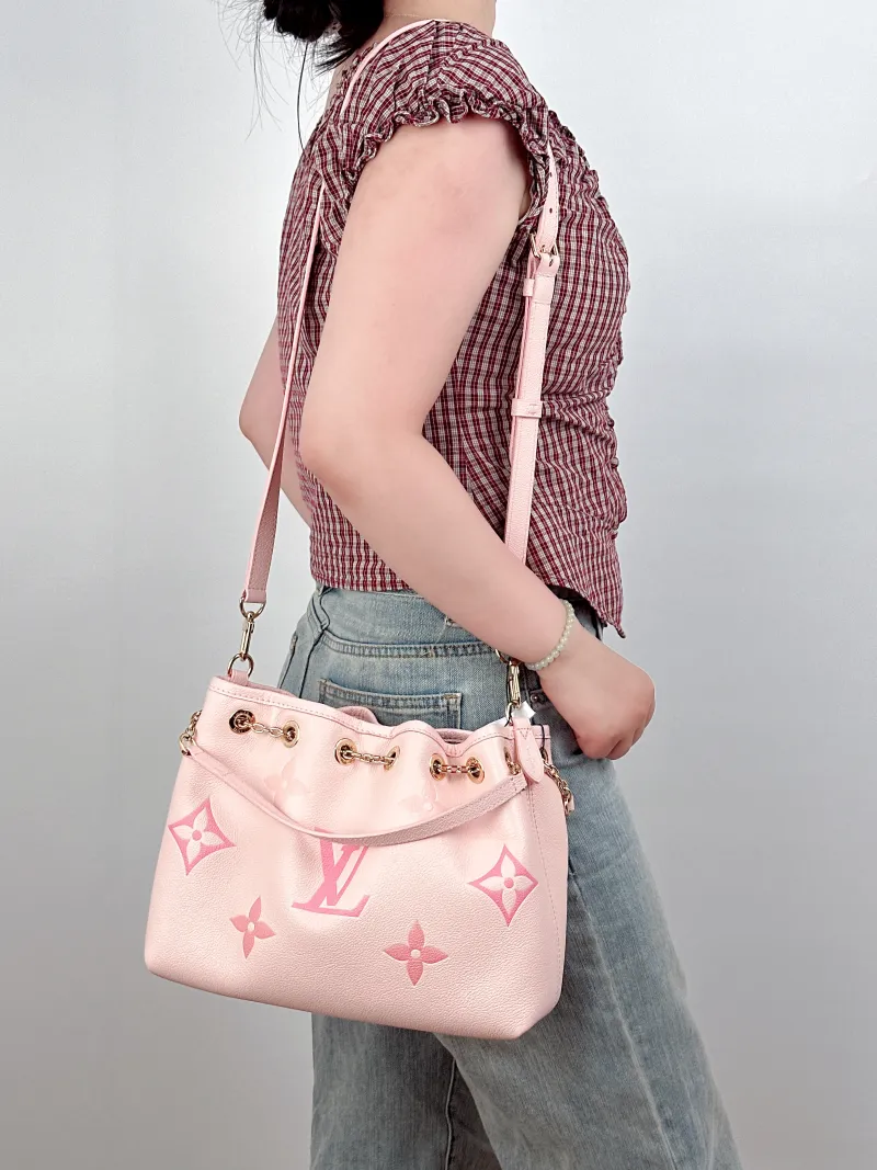 Louis Vuitton Crossbody Bag BUNDLE Pink Monogram Empreinte Embossed Calfskin28 × 11.5 × 20 cm — on-model view 2 of 4