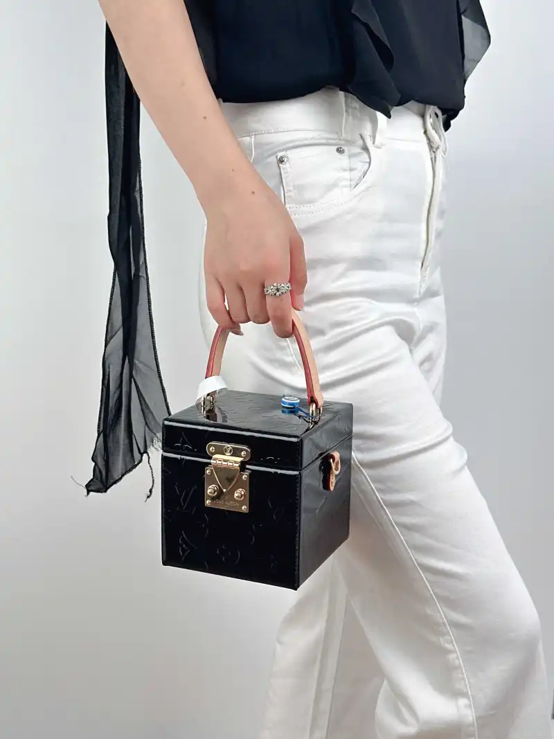 Louis Vuitton Top Handle Bag Bleecker Box Box Black Patent Leather 12 × 12 × 12 cm — on-model view 1 of 2