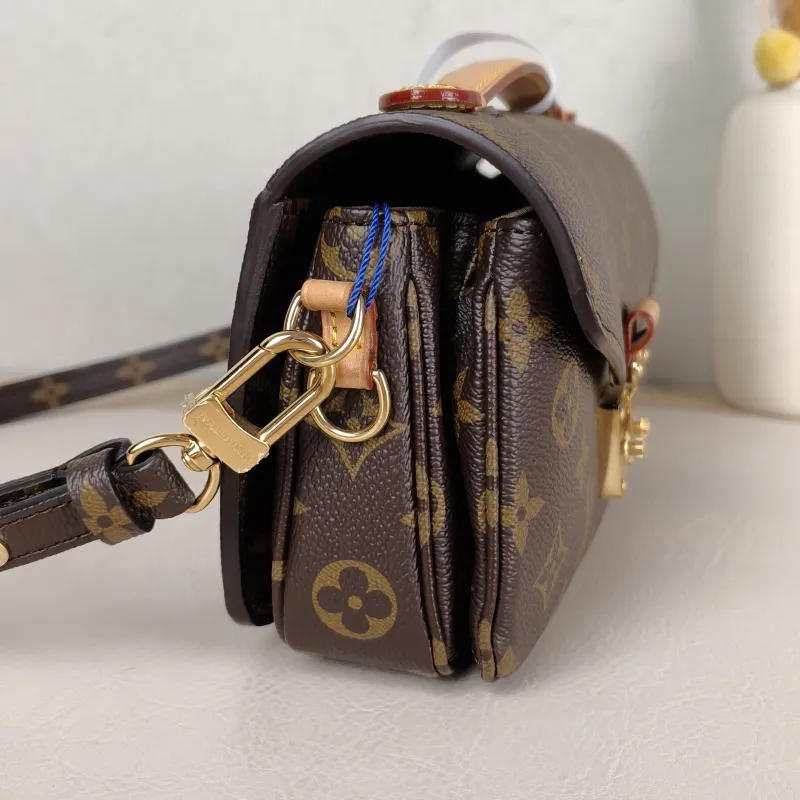 Louis Vuitton Crossbody Bag Pochette Métis East West Monogram PVC Small 21.5 × 6 × 13.5 cm — detail view 12 of 14