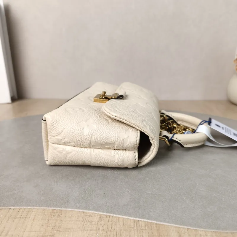 Louis Vuitton Crossbody Bag MADELEINE White Empreinte Embossed Calfskin nano 21 × 6 × 12.5 cm — detail view 2 of 11