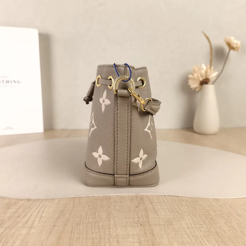 Louis Vuitton Crossbody Bag NANO NOÉ Bucket Bag Nano · White Empreinte Embossed Calfskin Monogramnano13 × 10 × 16 cm — detail view 3 of 11