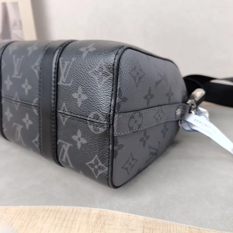 Louis Vuitton Crossbody Bag City Keepall Black PVC Medium 27 × 13 × 17 cm — detail view 4 of 12