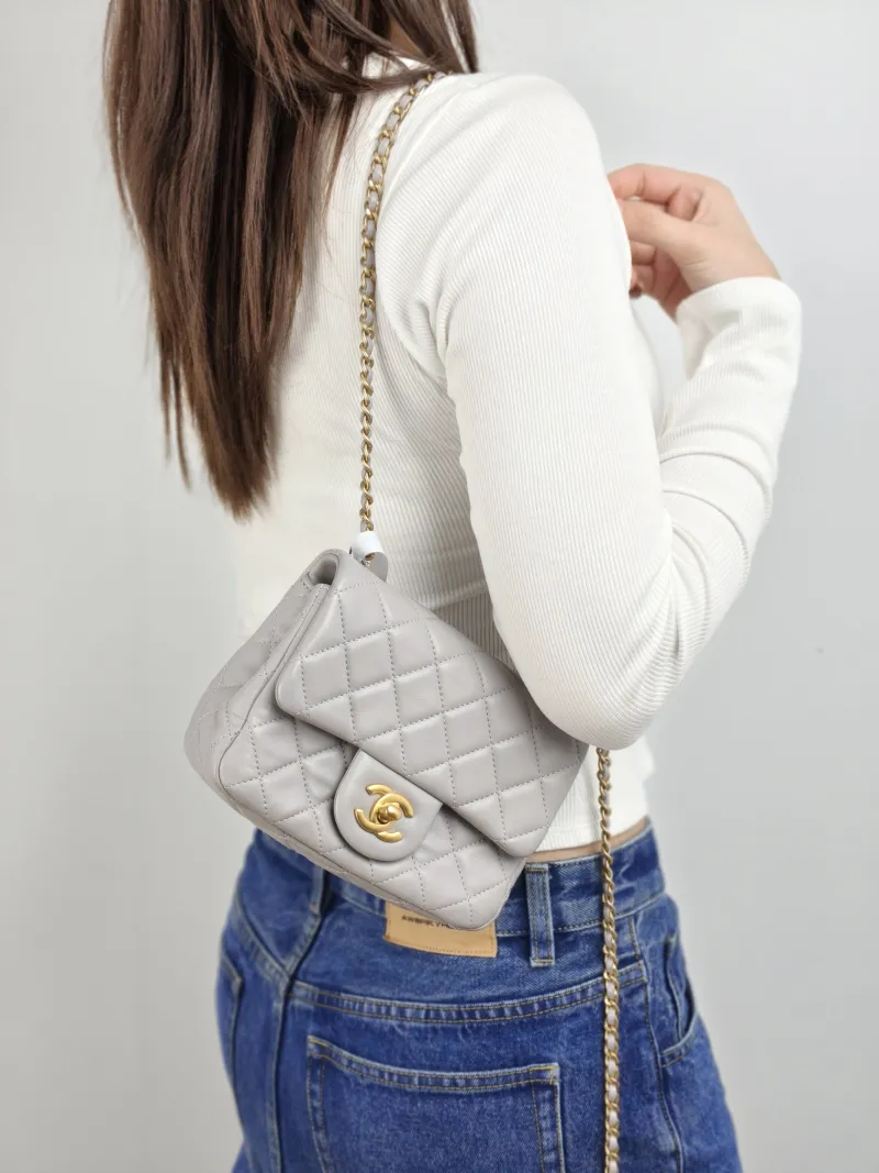 Chanel Crossbody Bag Grey Lambskin Mini 17 × 8 × 13.5 cm — on-model view 1 of 2