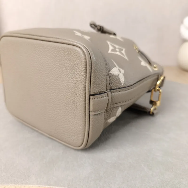 Louis Vuitton Crossbody Bag NANO NOÉ Bucket Bag Nano · White Monogram Empreinte Embossed Calfskin nano 13 × 10 × 16 cm — detail view 9 of 11