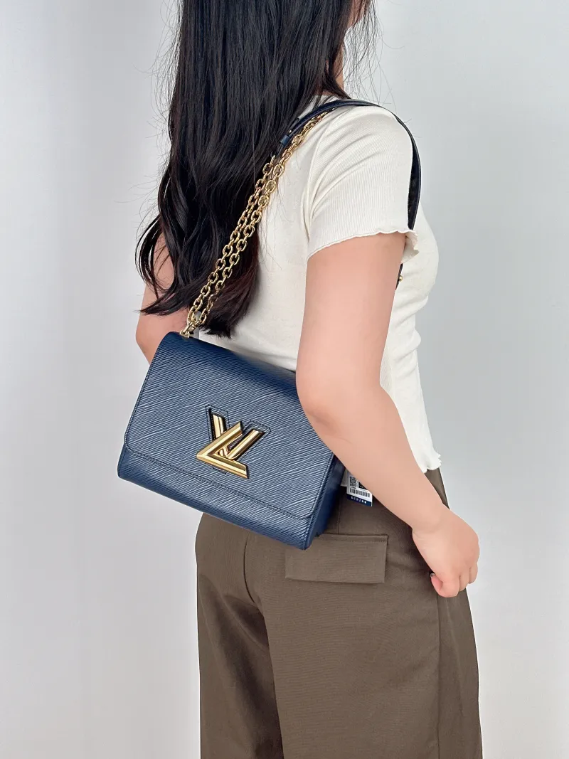 Louis Vuitton Crossbody Bag Twist Blue Epi Embossed Calfskin Medium23 × 9.5 × 17 cm — on-model view 1 of 2