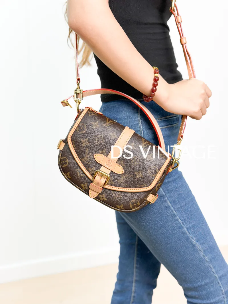 Louis Vuitton Crossbody Bag Saumur BB BB Monogram PVC BB 20 × 8 × 16 cm — on-model view 2 of 4
