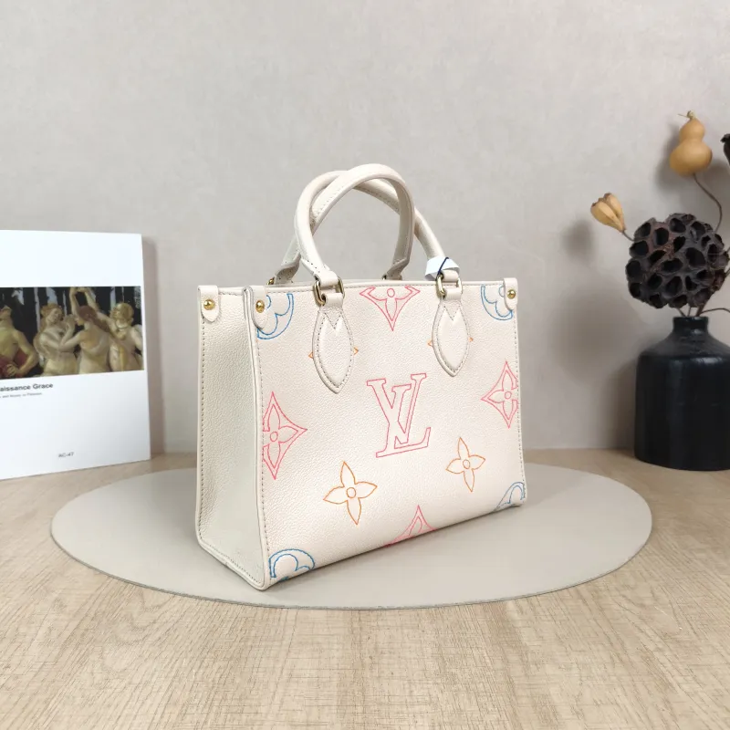 Louis Vuitton Top Handle Bag Onthego White · Embroidered Calfskin Small25 × 11.5 × 19 cm — cover view 3 of 5