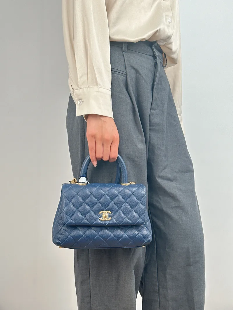 Chanel Top Handle Bag Coco Handle​ Grained Calfskin Small 24 × 10 × 14 cm 25 — on-model view 1 of 2