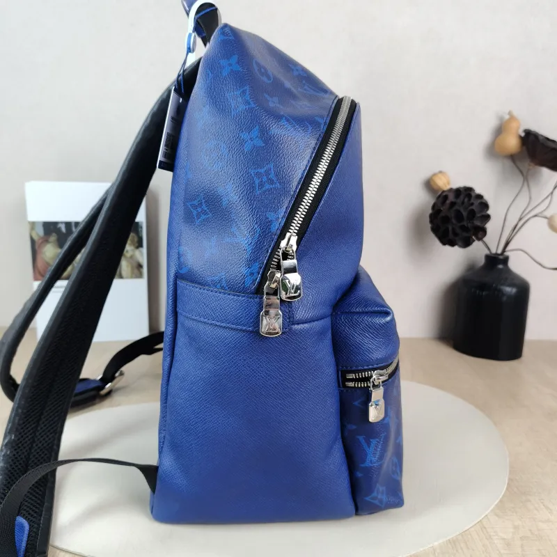 Louis Vuitton Backpack Discovery Backpack Blue PVC · Calfskin Small 37 × 20 × 40 cm — detail view 1 of 12