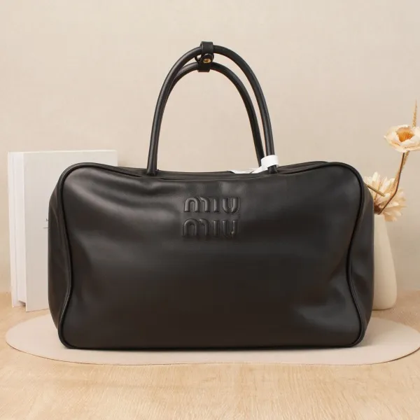 Miumiu Beau Bowling Bag Large Black Calfskin · 34 × 10 × 23 cm — cover view 1 of 7