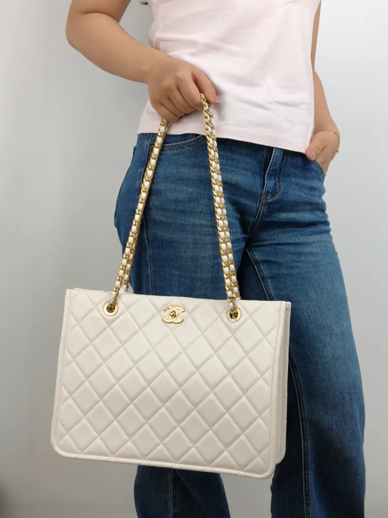 Chanel Shoulder Bag tote White Grained Calfskin 34 × 10 × 25.5 cm 31 — on-model view 1 of 2