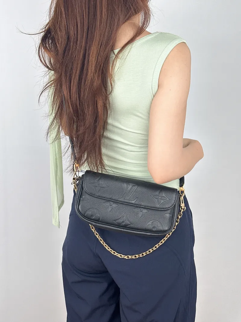 Louis Vuitton Crossbody Bag IVY Black Empreinte Embossed Calfskin Monogram Small23.5 × 4.3 × 12 cm — on-model view 1 of 2