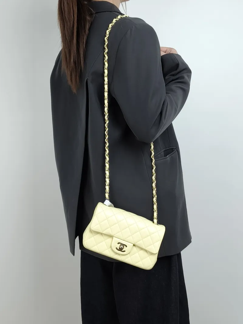 Chanel Crossbody Bag Classic Flap Large Mini CF Mini Yellow Lambskin mini 20 × 6 × 12 cm — on-model view 1 of 3