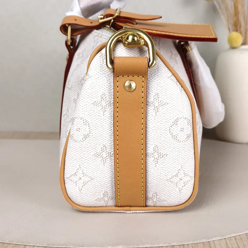 Louis Vuitton Crossbody Bag Keepall 25 White Monogram PVC Medium 25 × 11 × 15 cm — detail view 8 of 10