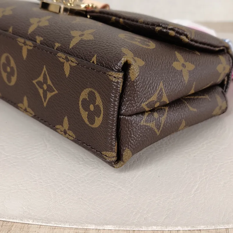 Louis Vuitton Crossbody Bag MADELEINE Monogram PVC nano 21 × 6 × 12.5 cm — detail view 4 of 11