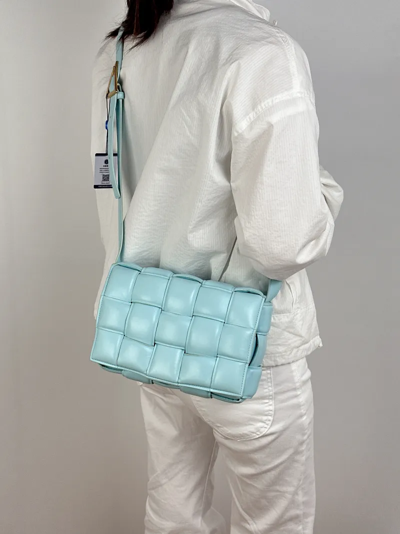 Bottega Veneta Crossbody Bag Padded Cassette Woven Blue Lambskin Medium26 × 8 × 18 cm — on-model view 2 of 2