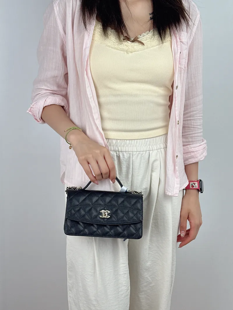 Chanel Crossbody Bag Black Grained Calfskin One Size19 × 7 × 11.5 cm — on-model view 1 of 2
