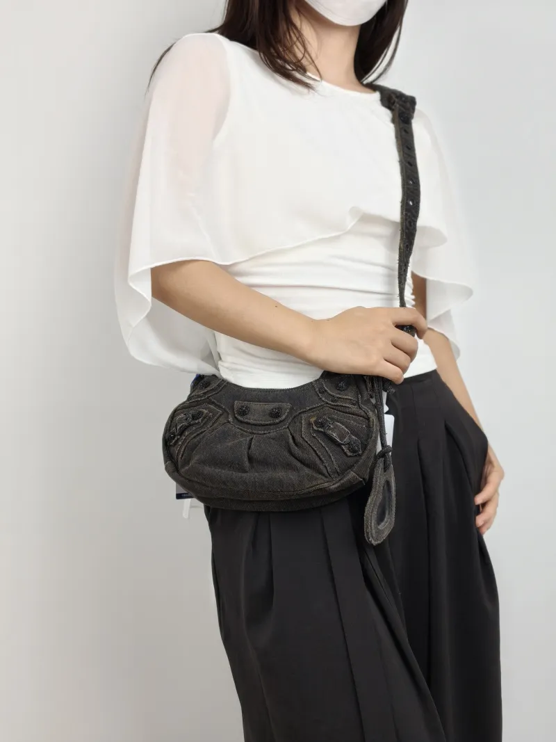 BALENCIAGA Crossbody Bag Black XS 26 × 7 × 16 cm — on-model view 1 of 2