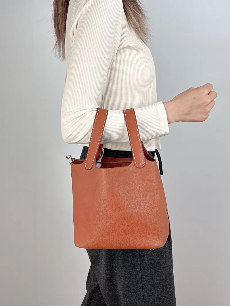 Hermès Top Handle Bag Picotin Lock 18 1834 Saddle Leather Small18 × 13 × 18 cm — on-model view 1 of 2