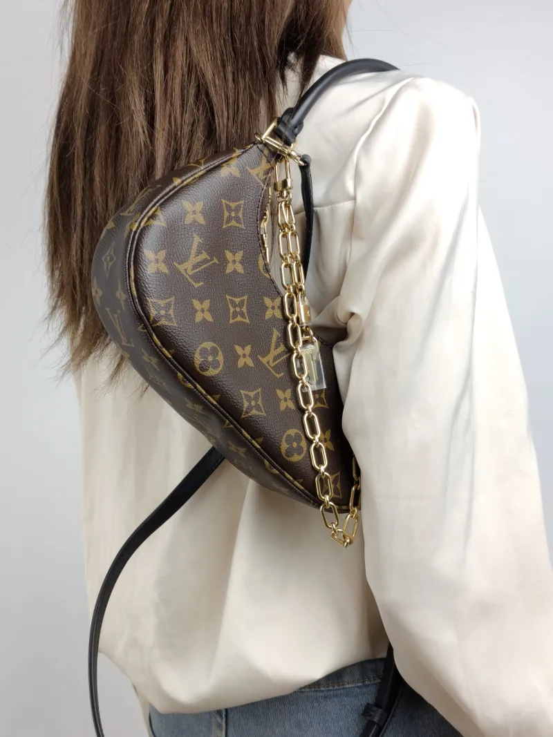 Louis Vuitton Shoulder Bag Catchy Monogram PVC Small 24 × 6 × 10 cm — on-model view 1 of 3