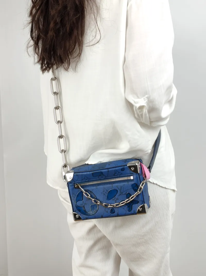 Louis Vuitton Crossbody Bag SOFT TRUNK Box Navy PVC Mini 18.5 × 8 × 13 cm — on-model view 1 of 2