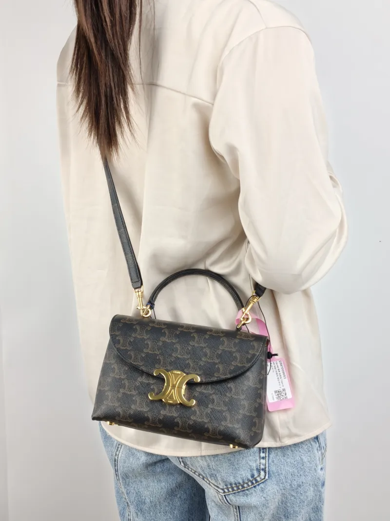 CELINE Top Handle Bag TEEN NINO Top Handle Bag Monogram PVC Small 20 × 8 × 13 cm — on-model view 2 of 3
