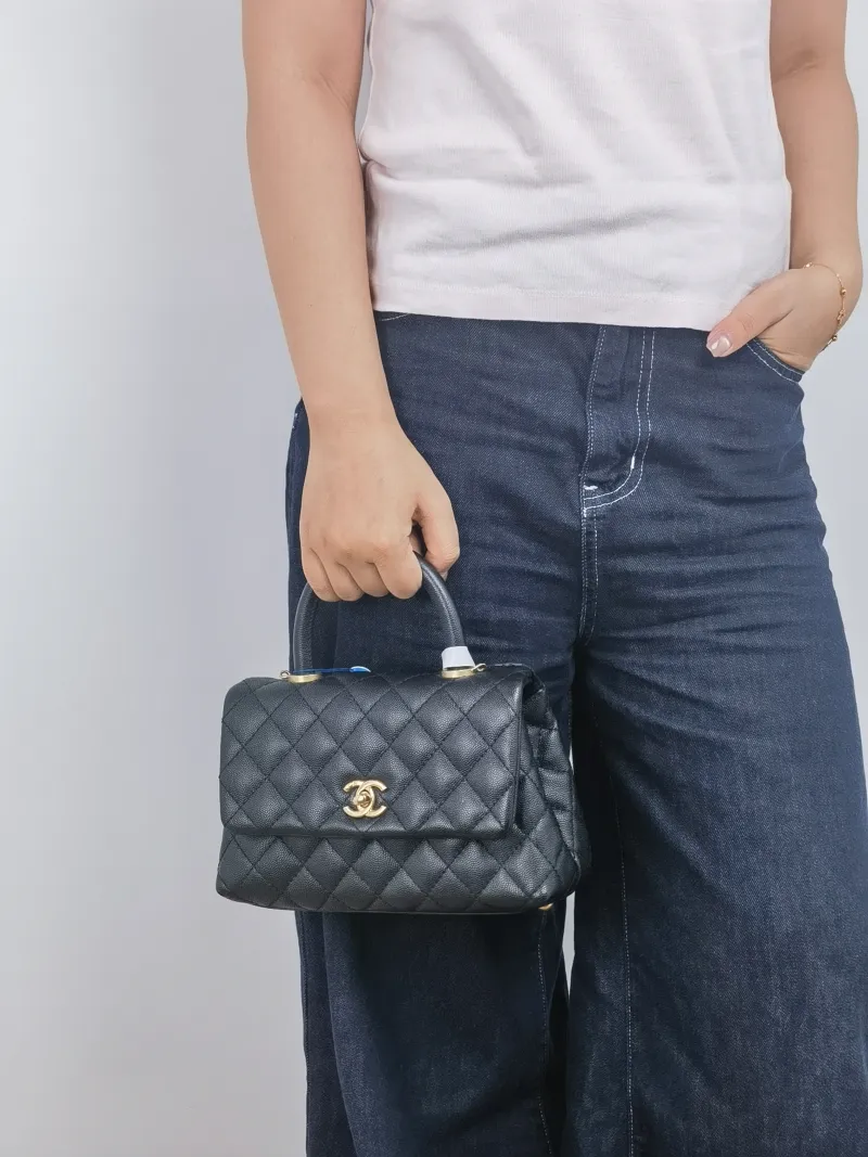 Chanel Top Handle Bag Coco Handle​ Black Grained Calfskin Small 24 × 10 × 14 cm 25 — on-model view 1 of 2