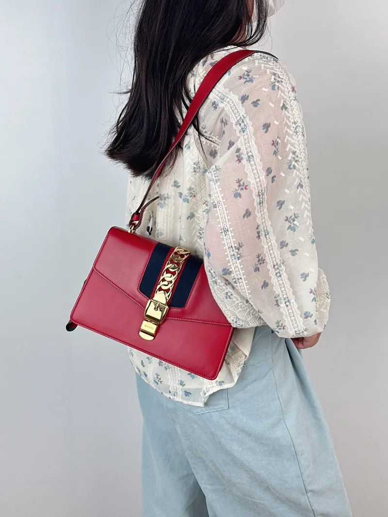 GUCCI Crossbody Bag Sylvie Shoulder Strap Edition Red Calfskin Small25.5 × 8 × 17 cm — on-model view 2 of 2