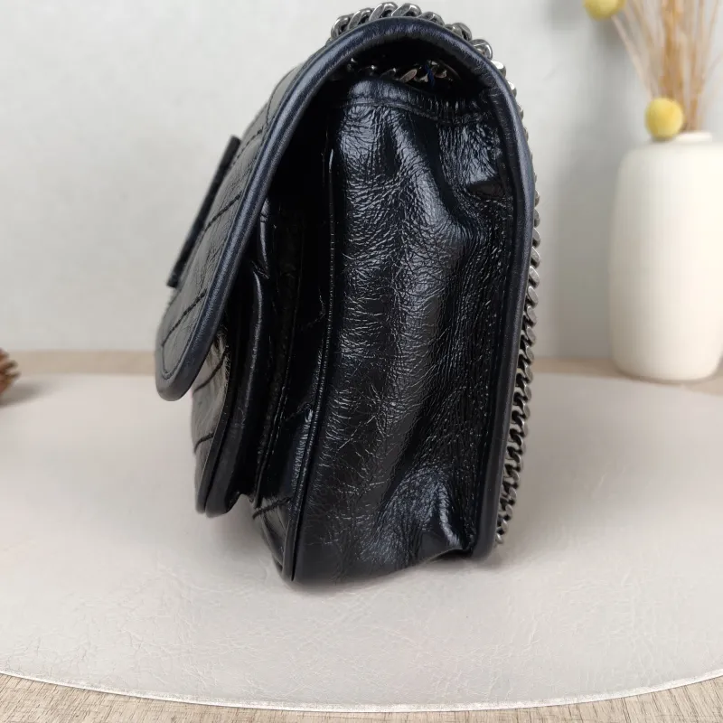SAINT LAURENT Crossbody Bag Niki Black Waxed Leather Calfskin Small 21 × 7.5 × 16 cm — detail view 1 of 13