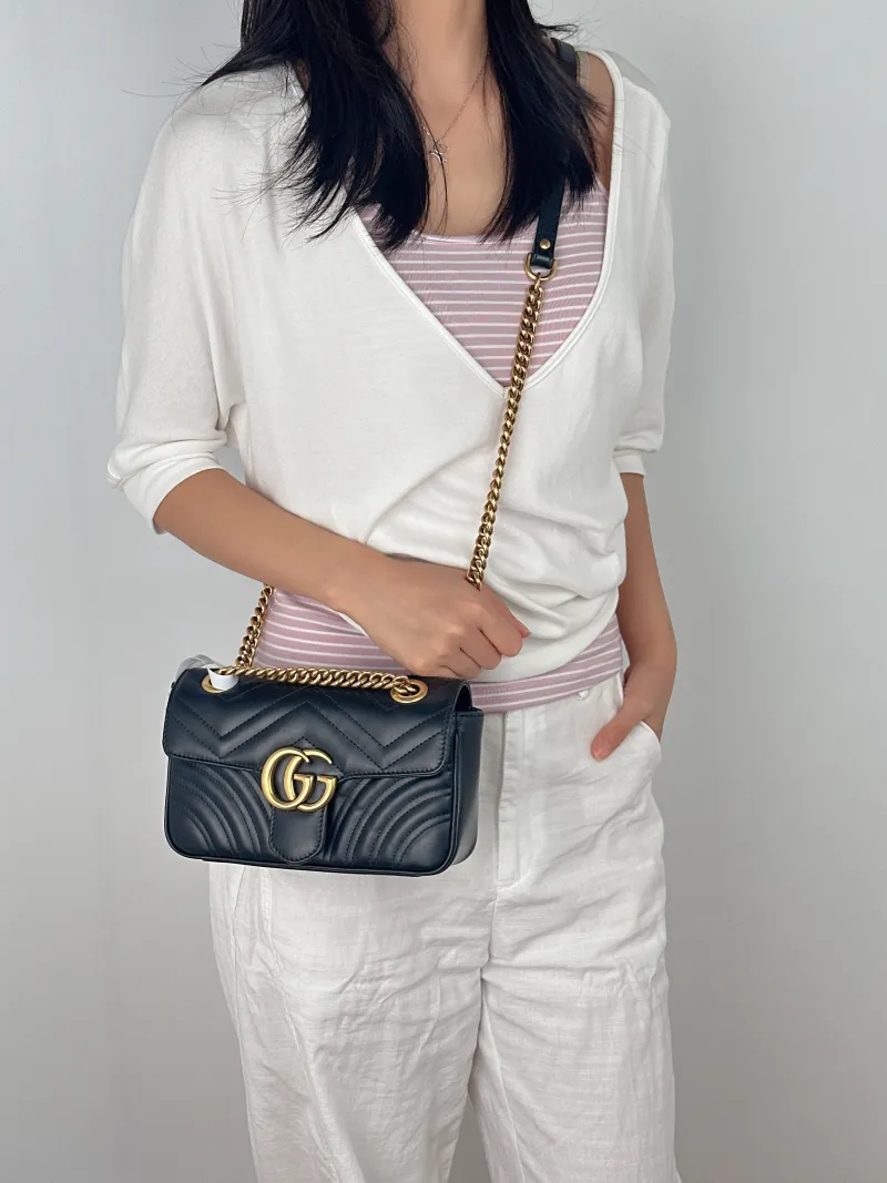 GUCCI Crossbody Bag GG Marmont Small Marmont 22Black CC alfskin Small22 × 6 × 13 cm — on-model view 2 of 2