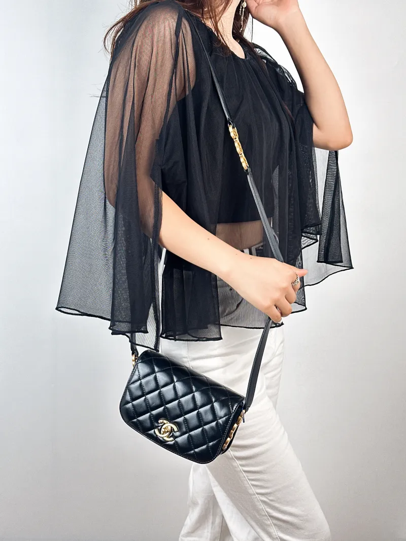 Chanel Crossbody Bag22a c Black Calfskinmini17.5 × 5.5 × 12 cm — on-model view 1 of 2
