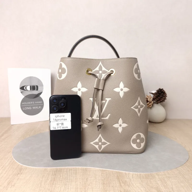 Louis Vuitton Shoulder Bag NÉONOÉ Bucket Bag · White Empreinte Embossed Calfskin Medium 26 × 17.5 × 26 cm — cover view 3 of 5