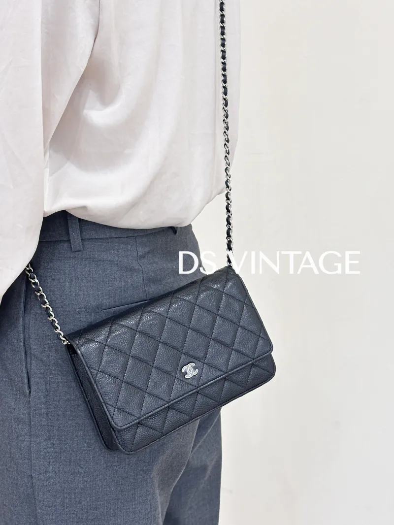Chanel Crossbody Bag Classic Flap WOC CF WOCWOC Bag Black Grained Calfskin Mini 19.2 × 3.5 × 12.3 cm — on-model view 1 of 3