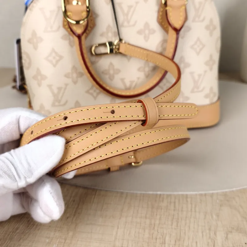 Louis Vuitton Top Handle Bag Alma BB PVCBB23.5 × 11.5 × 17.5 cm — detail view 10 of 12