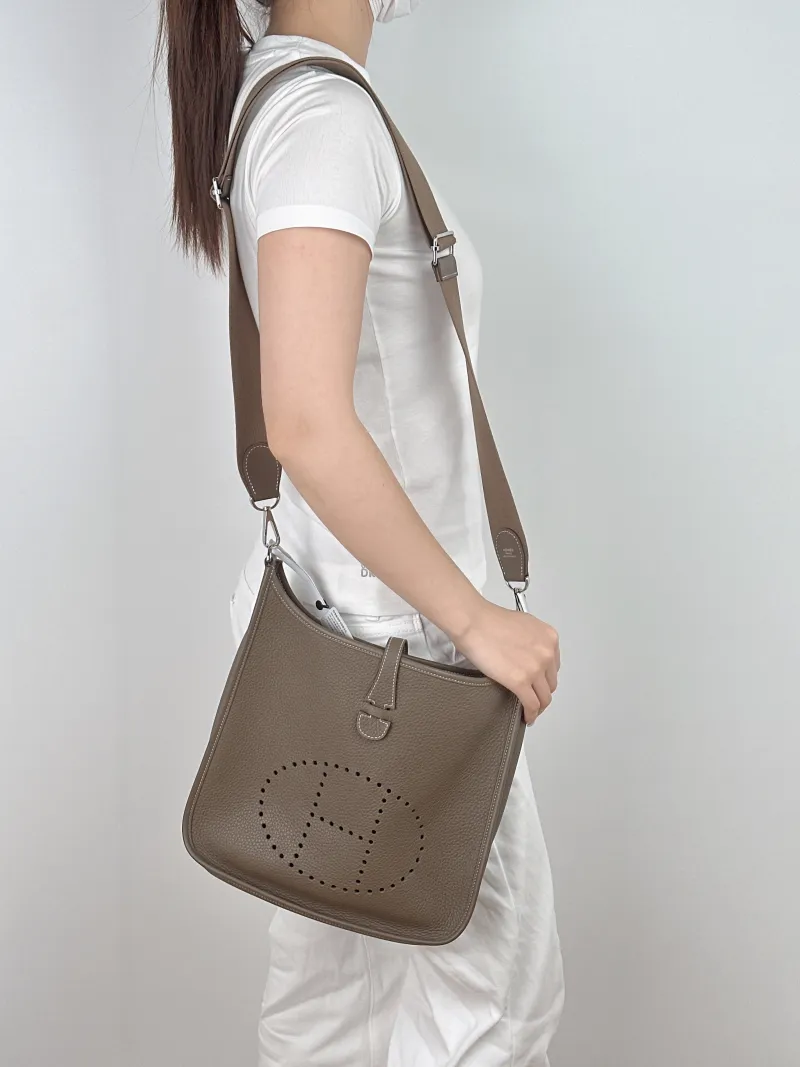Hermès Crossbody Bag Evelyne 29 29 Taurillon Clemence TC Calfskin Small 29 × 8 × 30 cm W — on-model view 1 of 2