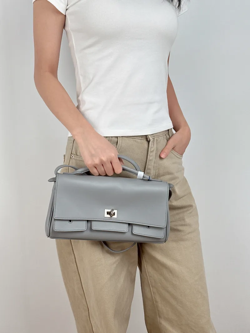 BALENCIAGA Crossbody Bag bel air Top Handle Crossbody Bag Grey Calfskin 27 × 5 × 14 cm — on-model view 3 of 3