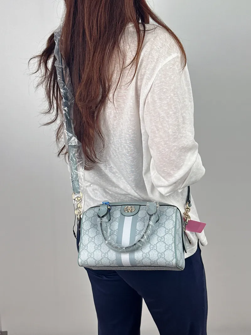 GUCCI Top Handle Bag Ophidia Blue PVC One Size 21 × 11 × 13 cm — on-model view 2 of 2