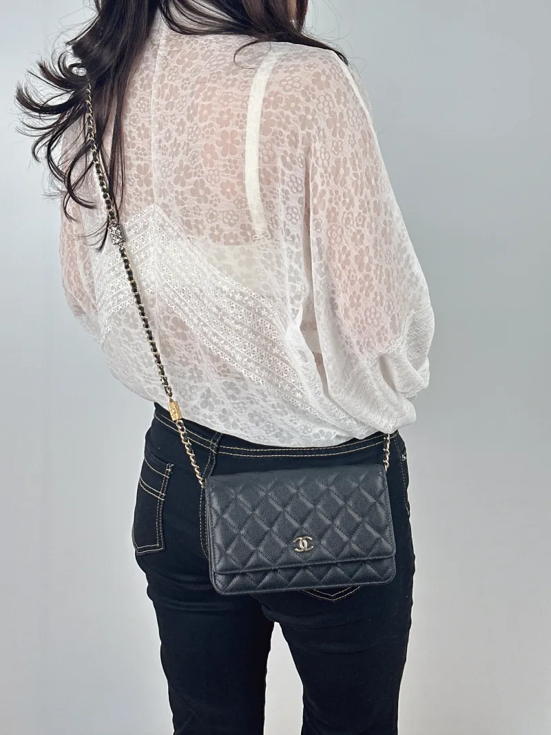 Chanel Crossbody Bag CF WOCWOC Bag Accessory Black Grained Calfskin Mini 19.2 × 3.5 × 12.3 cm — on-model view 1 of 2