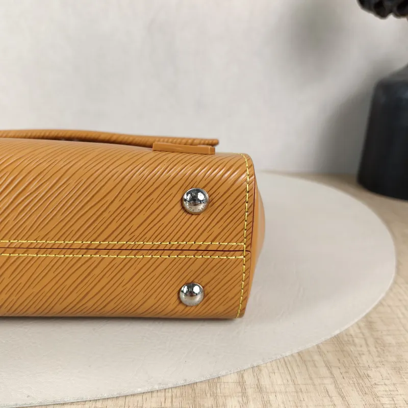 Louis Vuitton Crossbody Bag CLUNY Yellow Epi Embossed Calfskin Mini 20 × 7.5 × 16 cm Leather Tag — detail view 6 of 14