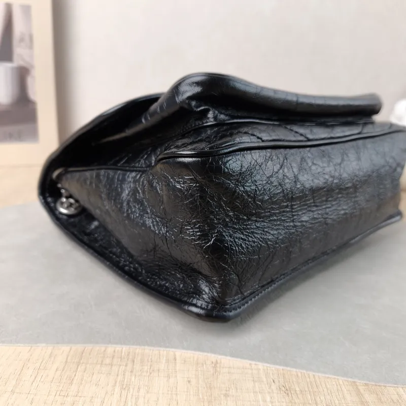 SAINT LAURENT Crossbody Bag Niki D Waxed Leather Calfskin Medium 28 × 8.5 × 20 cm — detail view 2 of 16