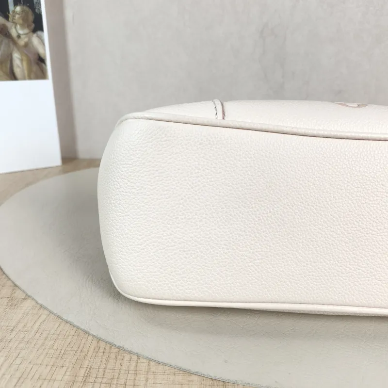 Louis Vuitton Crossbody Bag Boulogne Beige Monogram Empreinte Embossed Calfskin Small 26 × 9.5 × 16 cm — detail view 1 of 11