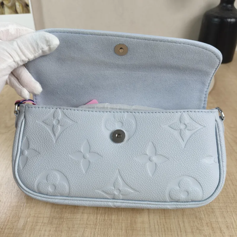Louis Vuitton Crossbody Bag IVY Blue Empreinte Embossed Calfskin Small 23.5 × 4.3 × 12 cm — detail view 12 of 13