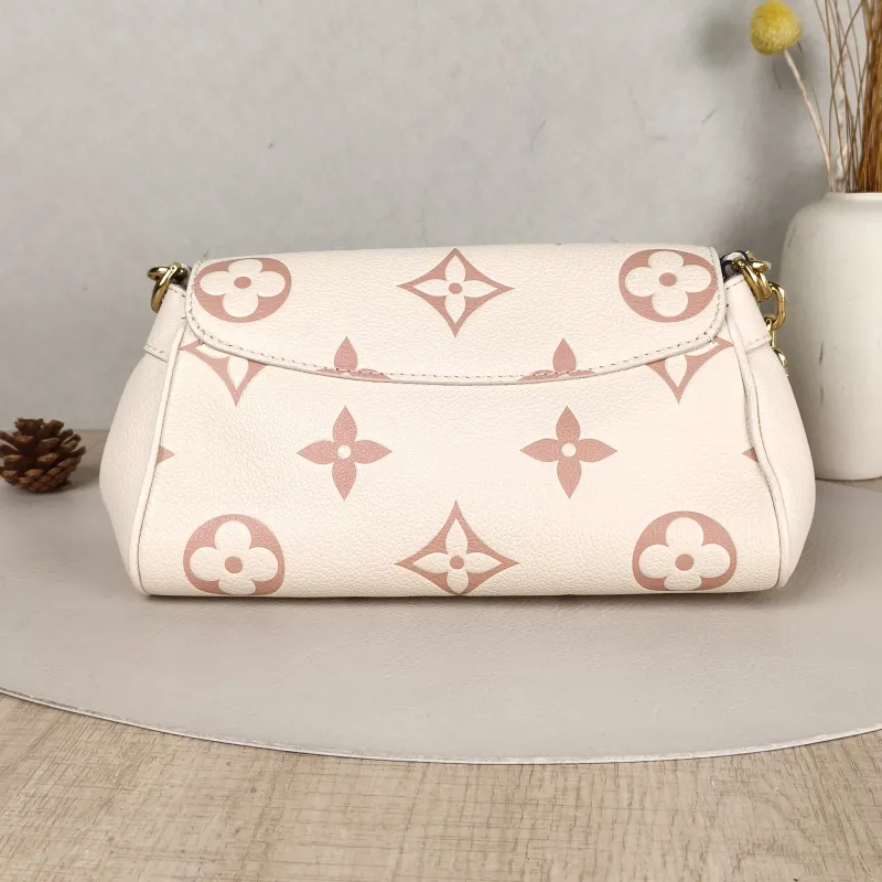 Louis Vuitton Crossbody Bag Favorite White · Pink Empreinte Embossed Calfskin Monogram Medium24 × 9 × 14 cm — cover view 4 of 6